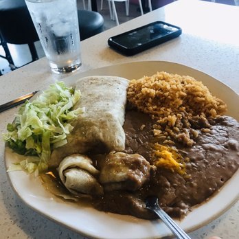 Rito's Mexican Food - Couldn't wait for the pic,that's a chili Verde burrito, rice & beans - Mexican Near Me - Phoenix, Arizona Rito's Mexican Food - Couldn't wait for the pic,that's a chili Verde burrito, rice & beans - Mexican Near Me - Phoenix, Arizona