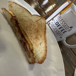 Delta Bean Coffee Bar and Cafe - This was the BLT with egg, little on the small side though. My husband was holding the other slide because he was eating it.