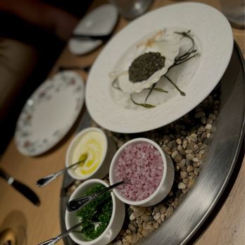 Rocca - Caviar service - accompaniments included house-made creme fraiche, green and red onions, chips, and tiny bread bites of joy. - Italian Near Me - Tampa, Florida
