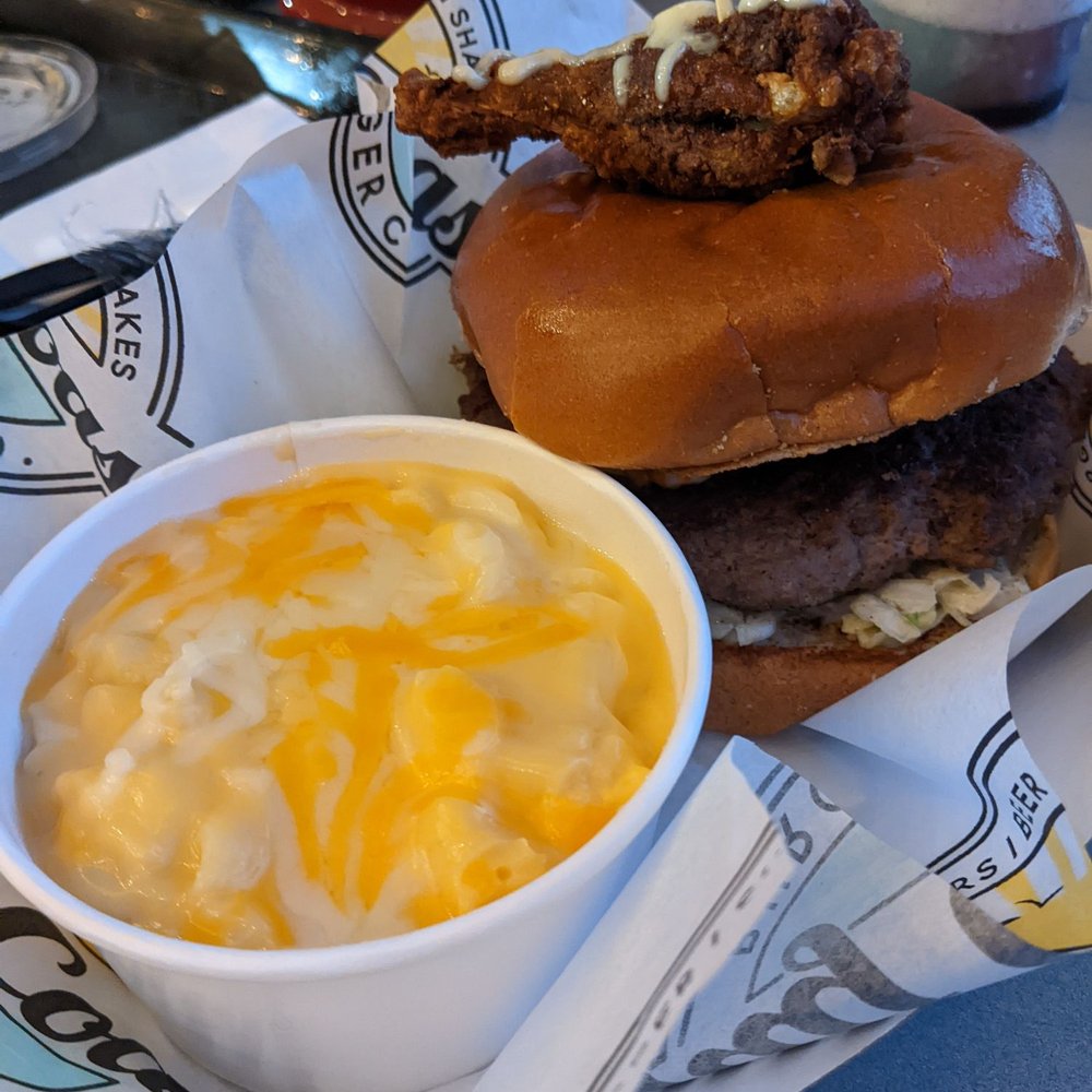 Alabama - super dry and hard chicken wing on top of the most bland burger I've ever had. We all thought everything was bland. Alabama - super dry and hard chicken wing on top of the most bland burger I've ever had. We all thought everything was bland.