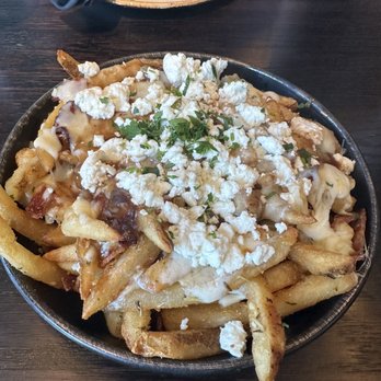 Puttshack - Boston - Poutine - Mini Golf Near Me - Boston, Massachusetts Puttshack - Boston - Poutine - Mini Golf Near Me - Boston, Massachusetts