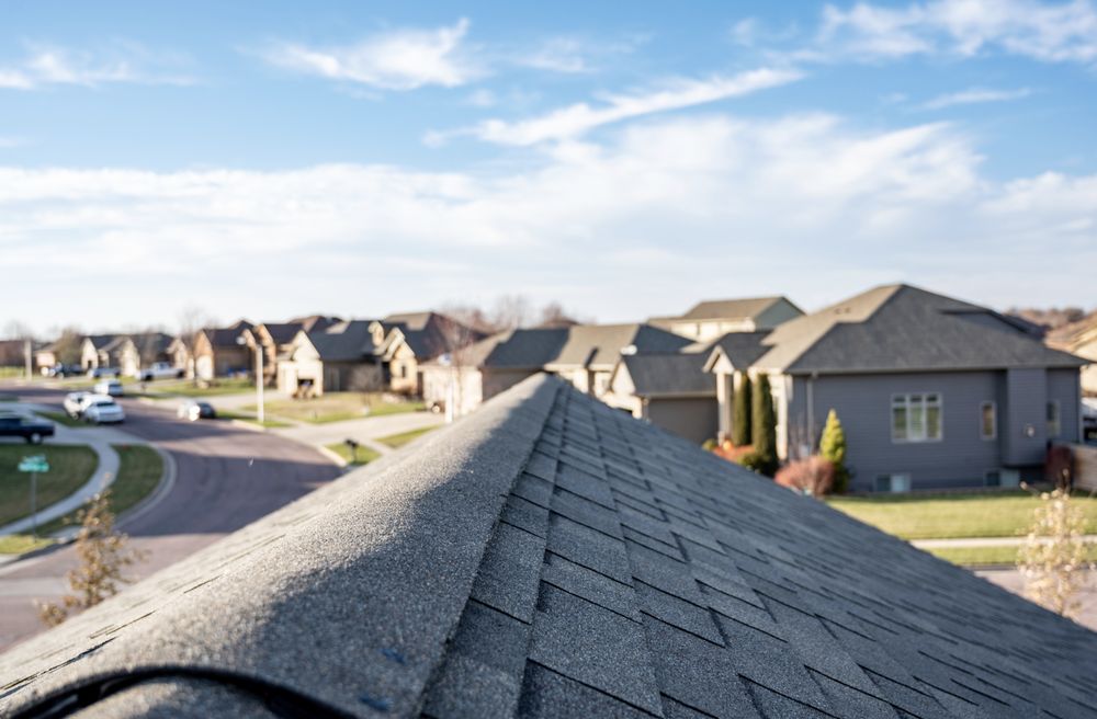 Slide of Akurate Roofing Group