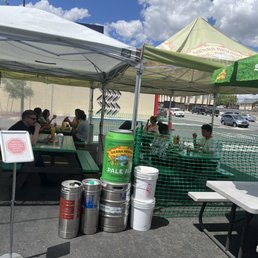 Outdoor seating. Some of the beer kegs