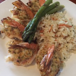Stuffed shrimp with flavorless white rice and three Spears of asparagus. Stuffed shrimp with flavorless white rice and three Spears of asparagus.