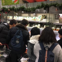 At 8pm people promptly descend in groves to grab the just discounted sushi!