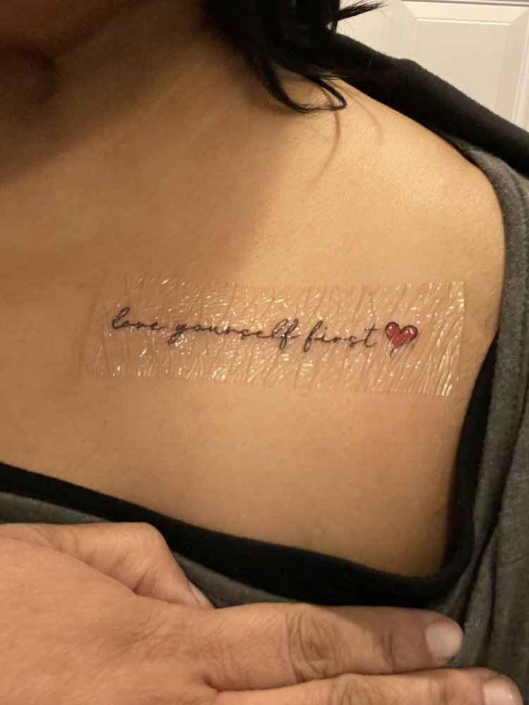 Playhouse Tattoo Studio Logo