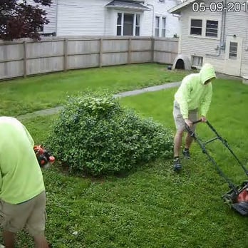 Smiley's Lawn & Landscape - two men mowing the lawn - Landscaping Near Me - Rushville, Indiana Smiley's Lawn & Landscape - two men mowing the lawn - Landscaping Near Me - Rushville, Indiana