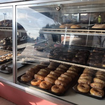 Bella's Coffee & Donuts - a display case full of doughnuts - Cupcakes Near Me - Russell Springs, Kentucky Bella's Coffee & Donuts - a display case full of doughnuts - Cupcakes Near Me - Russell Springs, Kentucky