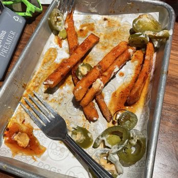 Dog Haus Biergarten - Waco - What's left of our spicy sweet potato fries (sorry, too good so the gram ate last!) - Burgers Near Me - Waco, Texas