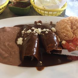 1/2 plate of enchilada de mole as we shared and they were nice enough to split the plate. 1/2 plate of enchilada de mole as we shared and they were nice enough to split the plate.