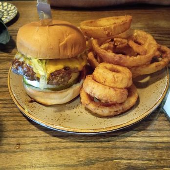 The Whiskey Six - W6 burger with onion rings. - New American Near Me - Grosse Pointe, Michigan The Whiskey Six - W6 burger with onion rings. - New American Near Me - Grosse Pointe, Michigan