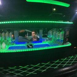 Russell Limousine - The bar has 2 ice chests. The right one comes stocked with bottled water & ice. We also include champagne or non alcoholic sparkling cider!
