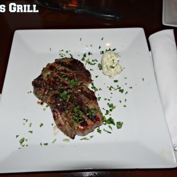 Hagan's Grill - Grilled Rib Eye Steak with White Truffle Oil Pommes Frites. - Bars Near Me - Hampton, New Hampshire Hagan's Grill - Grilled Rib Eye Steak with White Truffle Oil Pommes Frites. - Bars Near Me - Hampton, New Hampshire