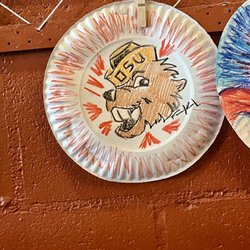 American Dream Pizza Downtown - Decorate a pizza plate while you wait for your food. Big hit with the kids!