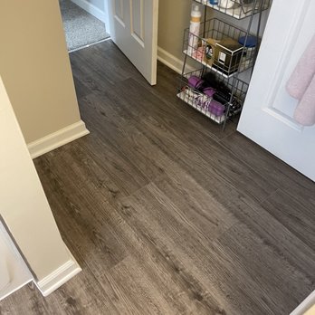 Falcon Renovations - a view of the hallway of a home - Flooring Near Me - Rochester, New York