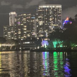 Tiki Time Party Boats - Night time city view