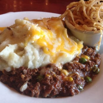 Cheddar's Scratch Kitchen - Shephards Pie. Irresistible. Onion strings normally come on top. I ask for them on side. - American Near Me - Cookeville, Tennessee Cheddar's Scratch Kitchen - Shephards Pie. Irresistible. Onion strings normally come on top. I ask for them on side. - American Near Me - Cookeville, Tennessee