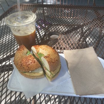 Doppio Coffee - Veggie breakfast sandwich w/ pesto on an asiago bagel. Delicious & fresh. - Coffee & Tea Near Me - Denver, Colorado Doppio Coffee - Veggie breakfast sandwich w/ pesto on an asiago bagel. Delicious & fresh. - Coffee & Tea Near Me - Denver, Colorado