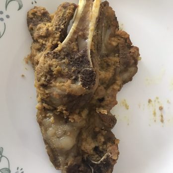 Shan Market - a white plate with a piece of meat on it - Grocery Near Me - Sacramento, California Shan Market - a white plate with a piece of meat on it - Grocery Near Me - Sacramento, California