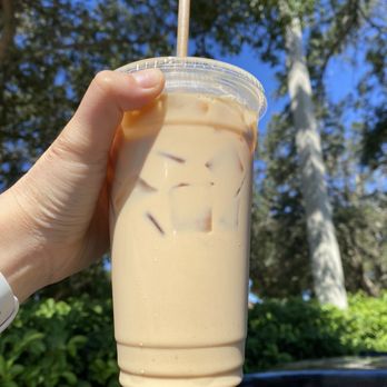 Holy Grain Coffee Shop - Conroy - 24 oz. Iced Hazelnut Latte - Coffee & Tea Near Me - Orlando, Florida Holy Grain Coffee Shop - Conroy - 24 oz. Iced Hazelnut Latte - Coffee & Tea Near Me - Orlando, Florida