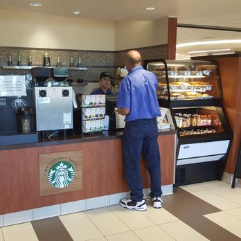 Garden Café - a man standing at the counter - Cafes Near Me - Sugar Land, Texas Garden Café - a man standing at the counter - Cafes Near Me - Sugar Land, Texas