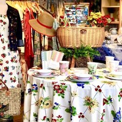 April Cornell - Poppy table linens, vintage feel and beautifully balanced with colors.