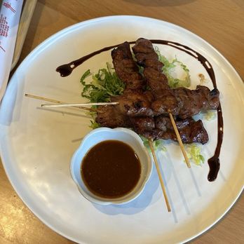 Manon - (Moo Ping) 4 Grilled Pork Skewers - Thai Near Me - Fullerton, California Manon - (Moo Ping) 4 Grilled Pork Skewers - Thai Near Me - Fullerton, California