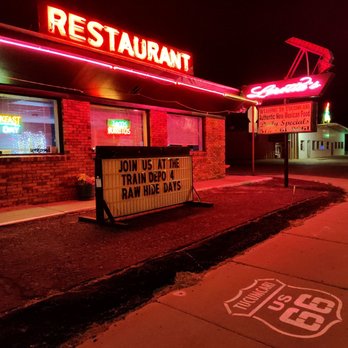 Loretta's Burrito Hut - a neon sign in front of a restaurant - New Mexican Cuisine Near Me - Tucumcari, New Mexico Loretta's Burrito Hut - a neon sign in front of a restaurant - New Mexican Cuisine Near Me - Tucumcari, New Mexico