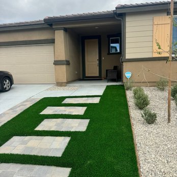 Victory Home Renovation - Stepping stone pavers framed in turf with decorative rock - General Contractors Near Me - Corona, California Victory Home Renovation - Stepping stone pavers framed in turf with decorative rock - General Contractors Near Me - Corona, California