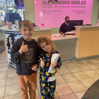 Blooming Smiles - kids enjoying - Orthodontists Near Me - Northridge, California Blooming Smiles - kids enjoying - Orthodontists Near Me - Northridge, California