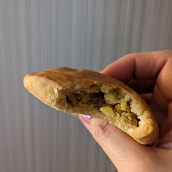 Dunkin' - Cross-section of my sausage, egg, and cheese empanada - Donuts Near Me - Niagara Falls, New York