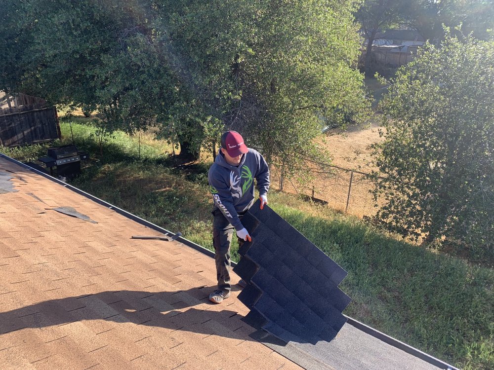 Slide of ZeZee Roofing