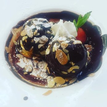 Chez Joel Bistro - Oh these profiteroles were decadent and a beauty to behold - French Near Me - Chicago, Illinois