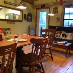 Hemlock Hollow Inn & Paint Creek Cafe - No dogs allowed inside, yet here is their dog on the couch right next to the kitchen/dinning area