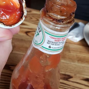 Barrio Brewing - Ketchup bottle and lid at our table - American Near Me - Mesa, Arizona Barrio Brewing - Ketchup bottle and lid at our table - American Near Me - Mesa, Arizona