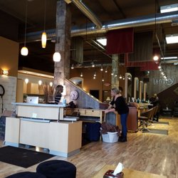 Vanity Salon - Inside of Vanity Salon and employees folding towels.