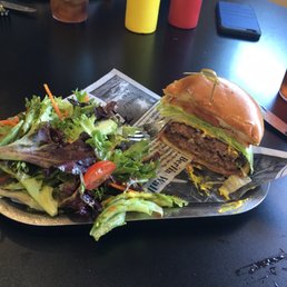 a sandwich and salad on a plate a sandwich and salad on a plate