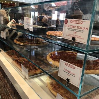 Slice House by Tony Gemignani - View of pizza slices while waiting in line to order - Pizza Near Me - Castro Valley, California Slice House by Tony Gemignani - View of pizza slices while waiting in line to order - Pizza Near Me - Castro Valley, California