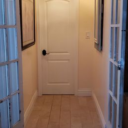 Entrance to our half bathroom. For decades my parents never fixed that chandelier well, I did and made it look beautiful..
