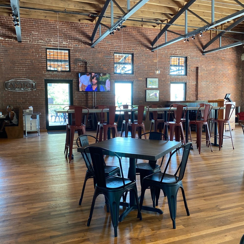 a large room with tables and chairs