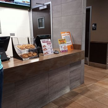 Burger King - a woman standing in front of a counter - Burgers Near Me - Gainesville, Florida