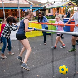 weFooz Human Foosball - Adults and children play side by side.