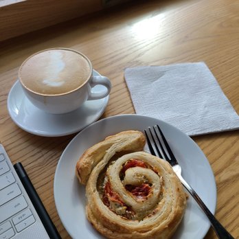 Sugar Bakery - 8oz latte, tomato and goat cheese spiral - Coffee & Tea Near Me - Seattle, Washington Sugar Bakery - 8oz latte, tomato and goat cheese spiral - Coffee & Tea Near Me - Seattle, Washington