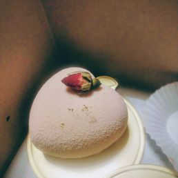 This is a raspberry mousse cake with somewhat of a creme brulee bottom in the inside it was phenomenal This is a raspberry mousse cake with somewhat of a creme brulee bottom in the inside it was phenomenal