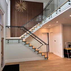 Best Choice Glass & Railing - Modern frameless glass railing for residential staircase in burnaby, Lower Mainland.