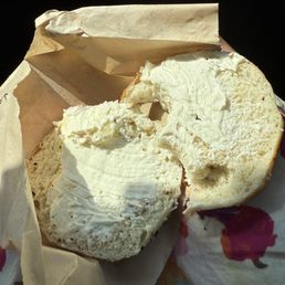 "Veggie" cream cheese and an untaosted bagel "Veggie" cream cheese and an untaosted bagel