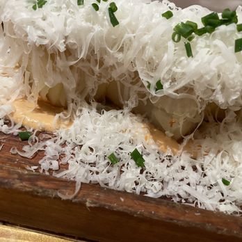 Oak Bistro - Close up of the Thousand Layer Crispy Potato Pave. - New American Near Me - Cambridge, Massachusetts