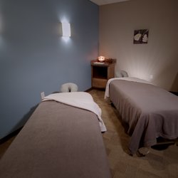 Hand & Stone Massage and Facial Spa - Relax and reconnect in our peaceful couples room.