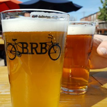 Bike Rack Brewing - Sunny day and pints on the deck. - Breweries Near Me - Bentonville, Arkansas Bike Rack Brewing - Sunny day and pints on the deck. - Breweries Near Me - Bentonville, Arkansas