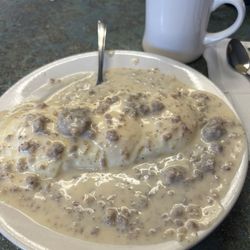 Coffman's Snack Bar - Friday special sausage gravy over biscuits with two eggs over easy. You need a nap after this.